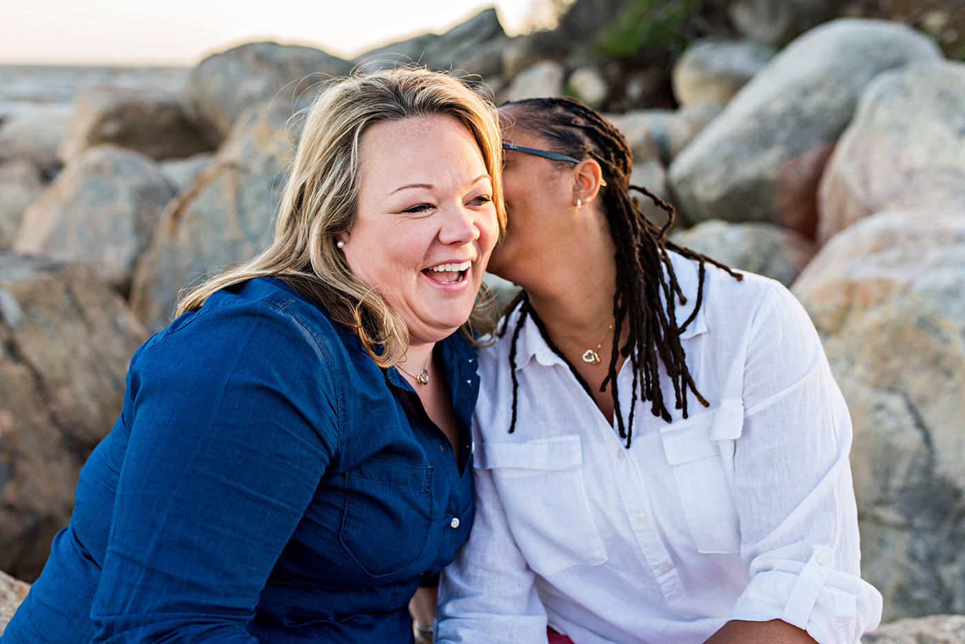 two women laughing at hammonasset beach connecticut wedding photography