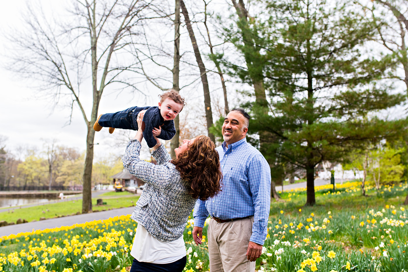 mother holding son in field of daffodils meriden connecticut family photography