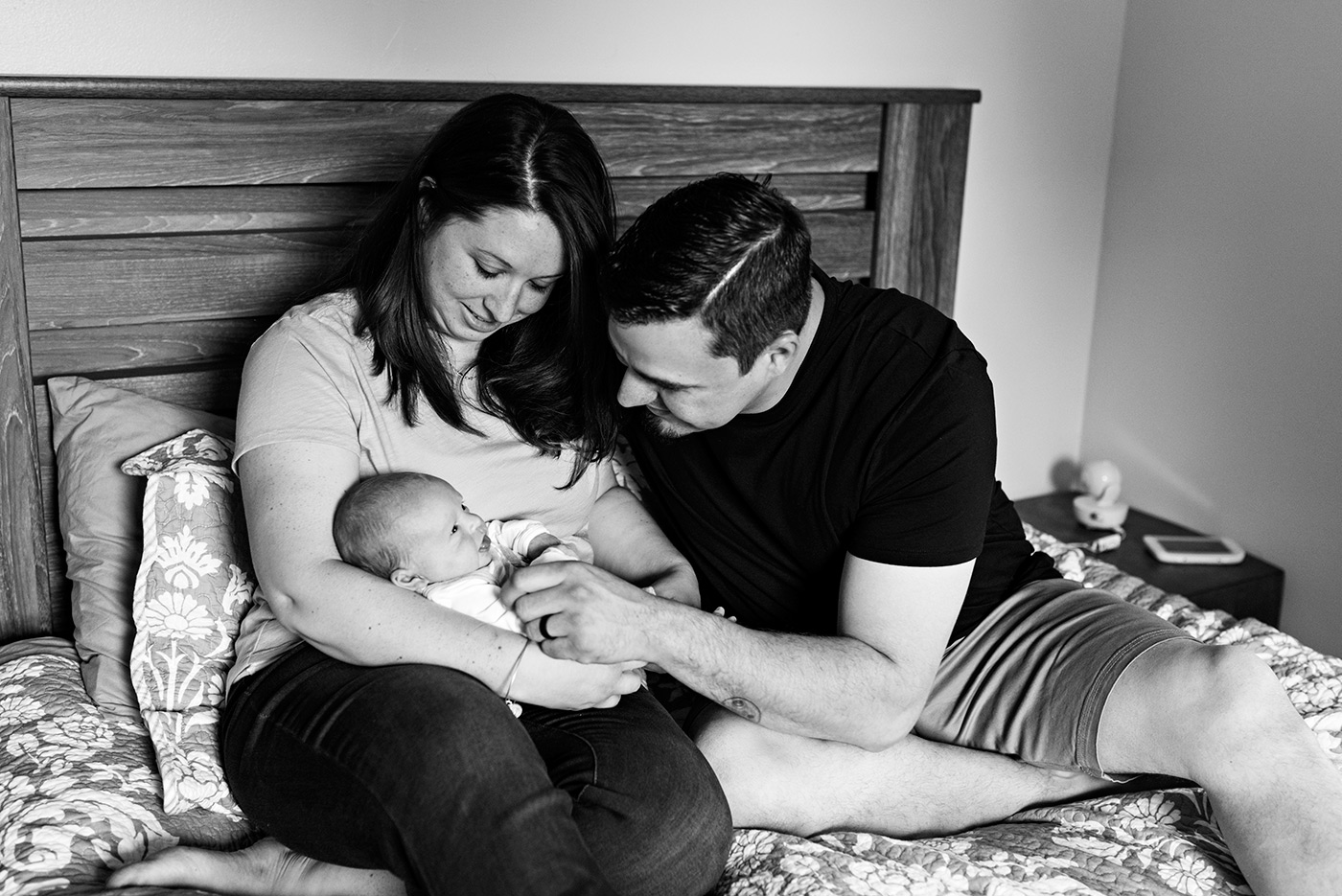 mom and dad smiling at newborn son southington, ct newborn photography
