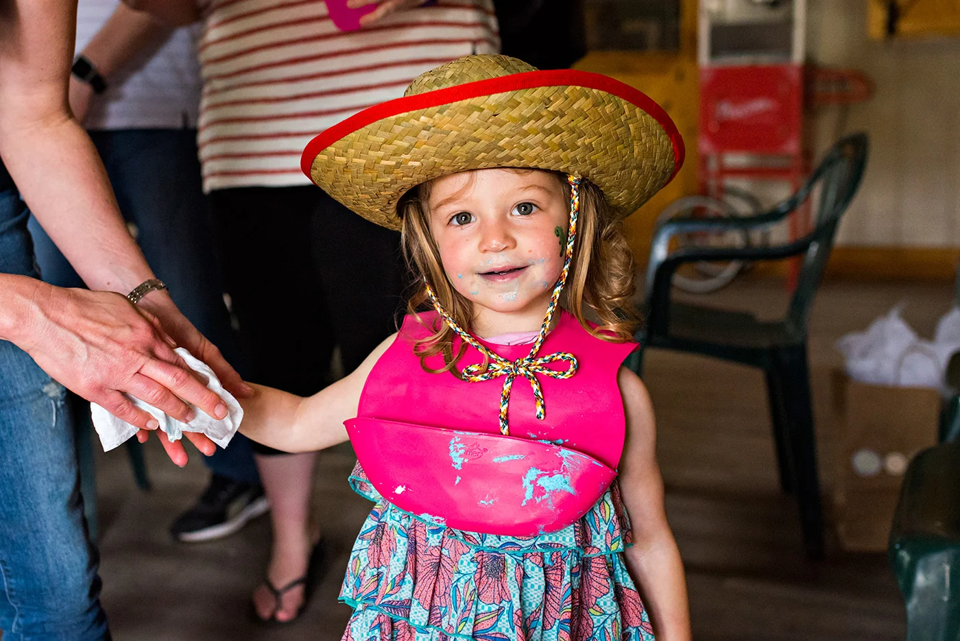 girl with cake on face and cowboy hat ct family photographer