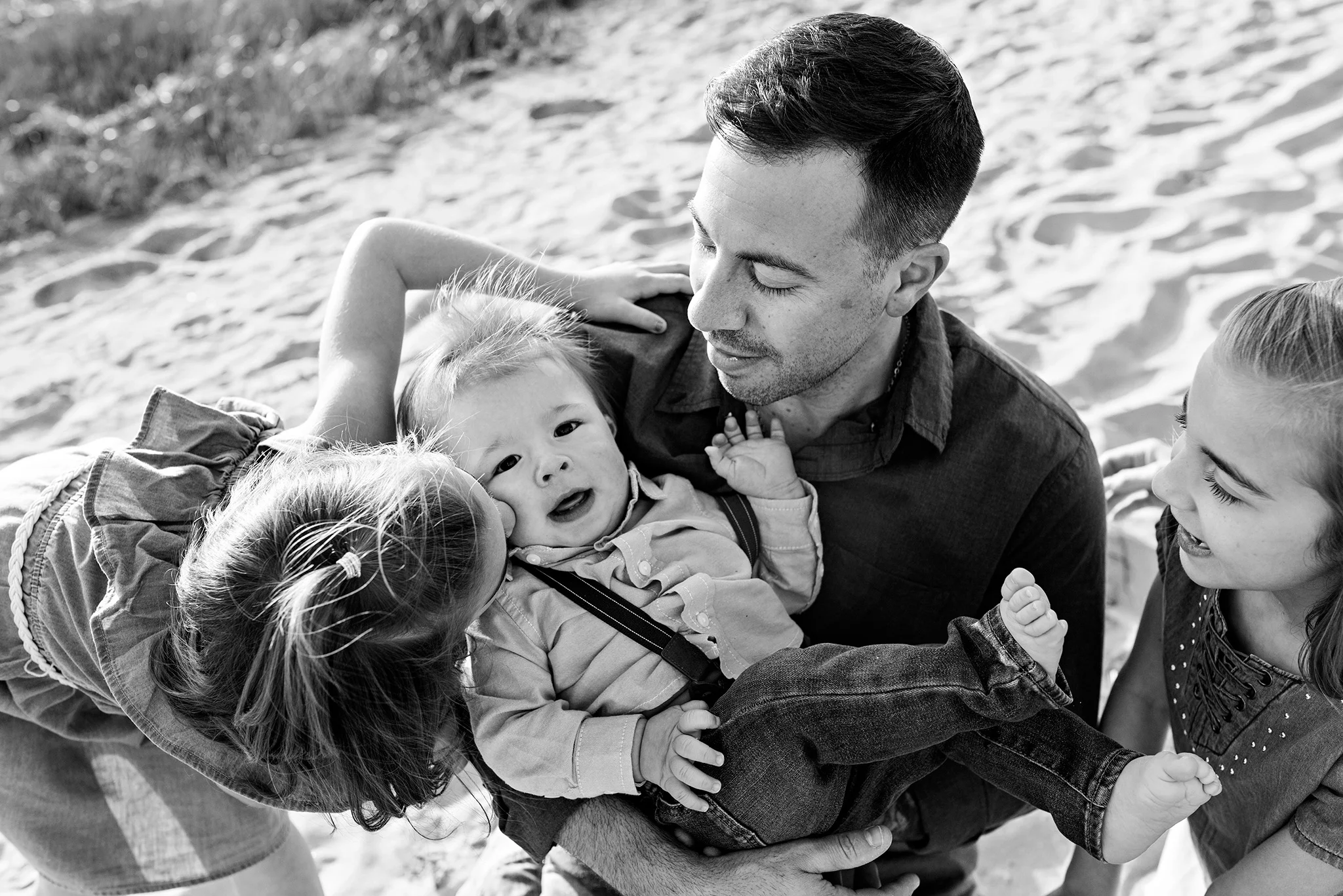 sister kissing brothers cheek lifestyle family photography ct