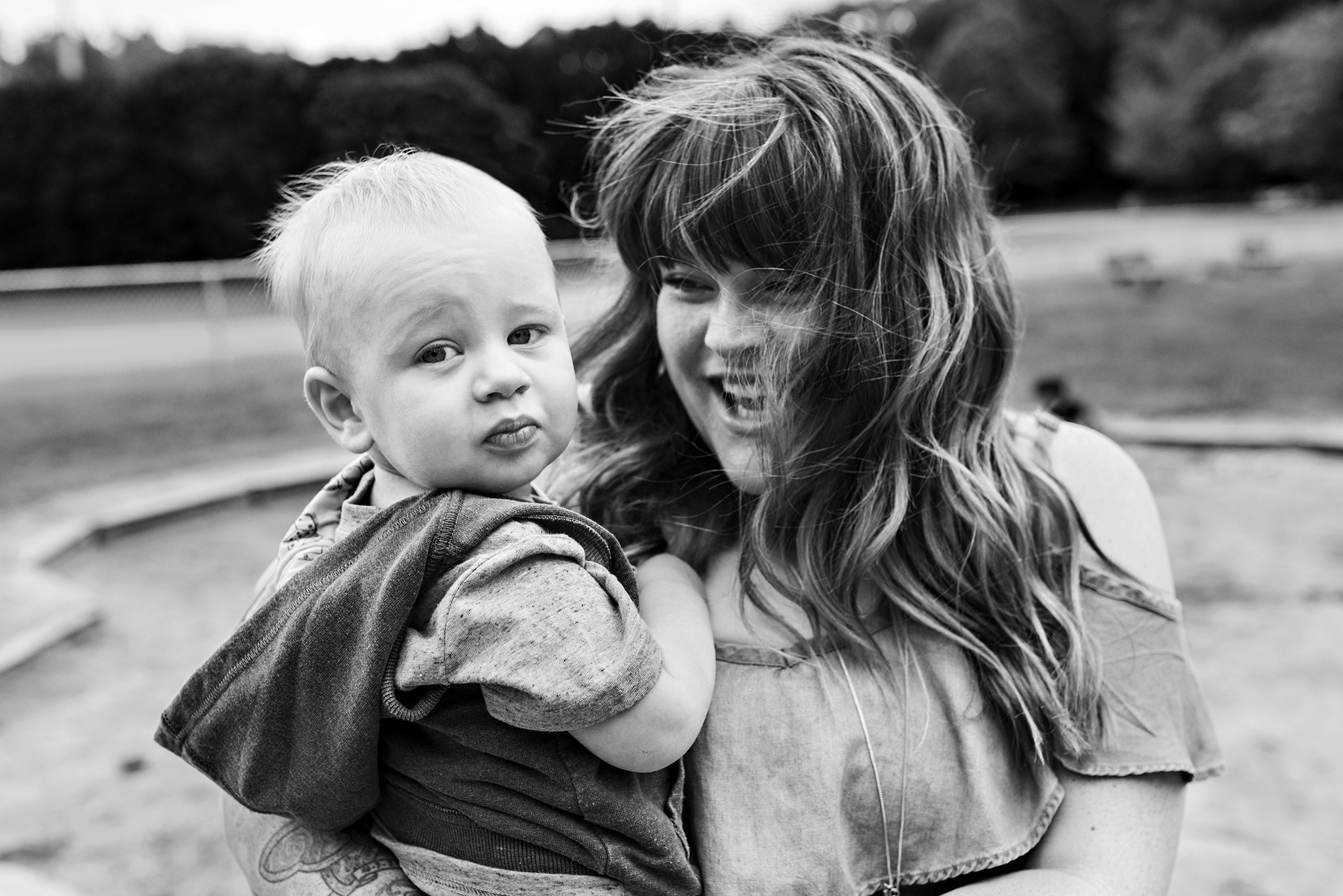 mom smiling holding son connecticut family photography panthorn park plainville ct