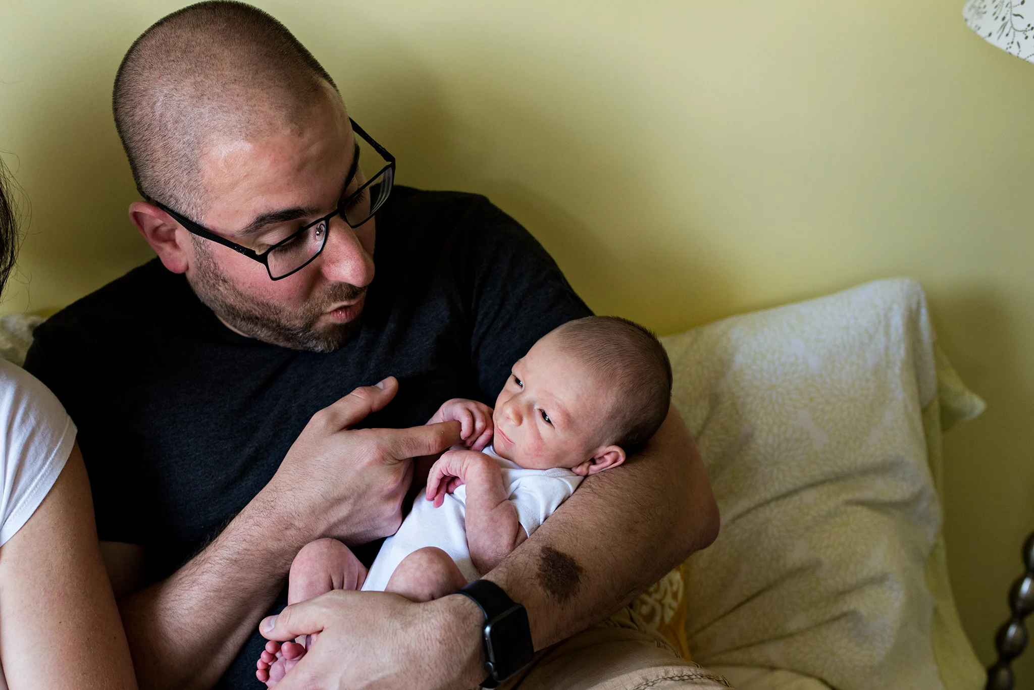 newborn boy holding dad's finger. manchester, ct newborn photography