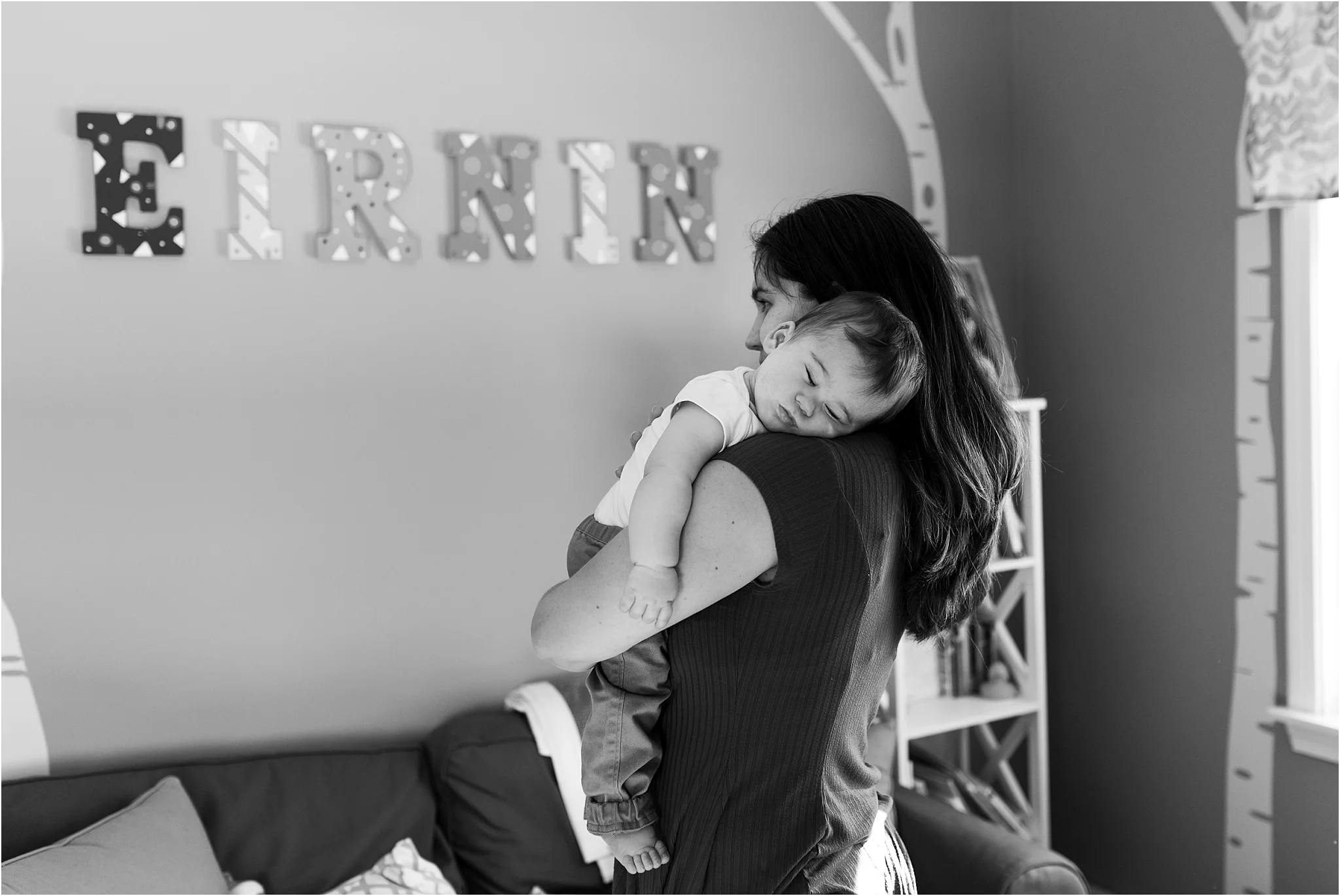 baby sleeping in nursery in home family photography ct