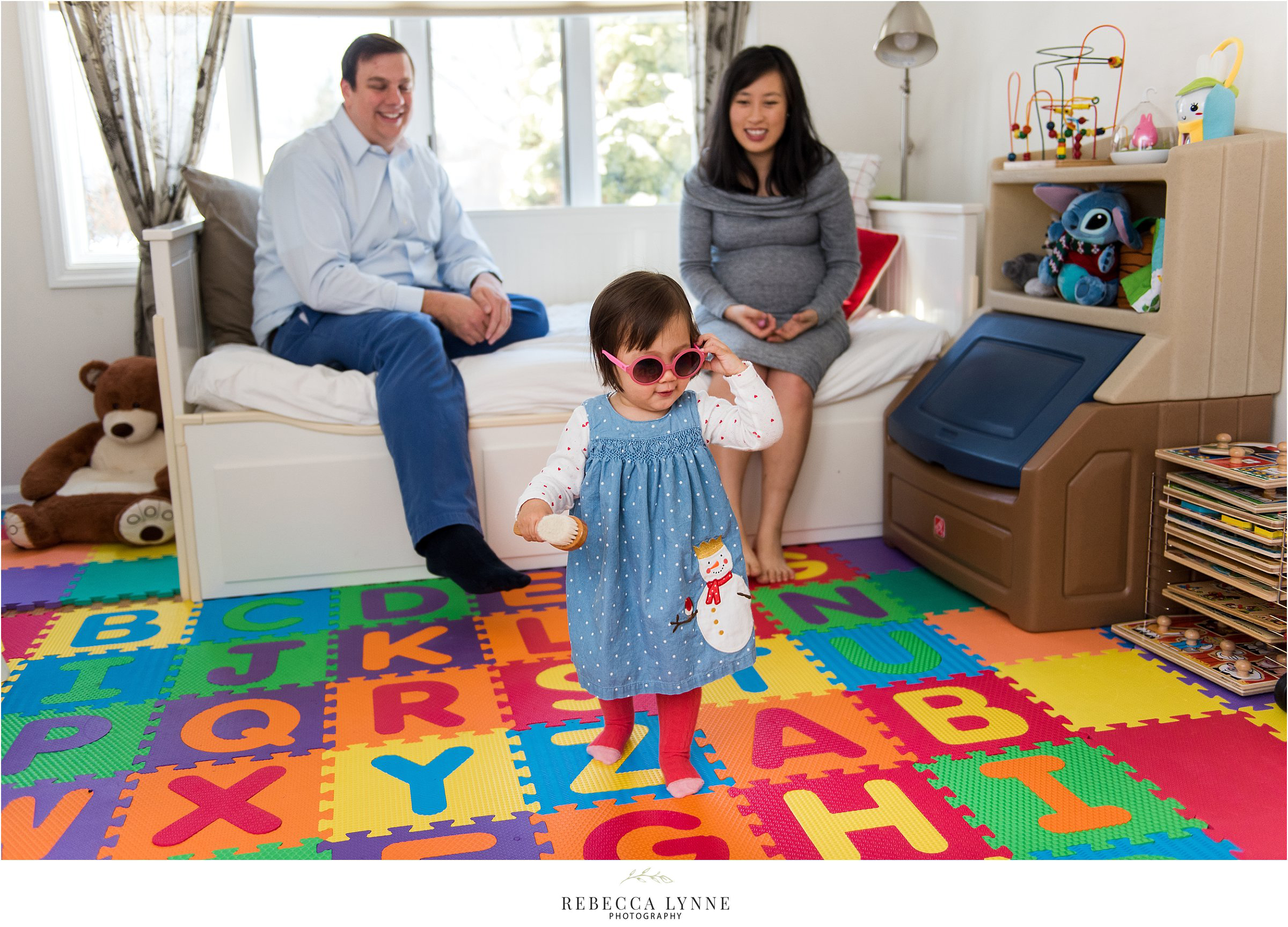 toddler playing dress up. lifestyle maternity photos.