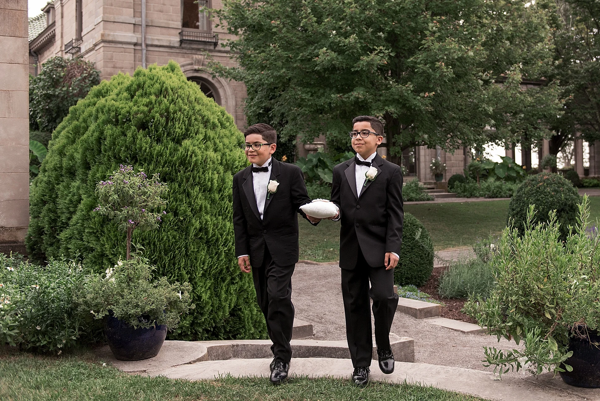 ring bearer at Eolia Mansion wedding ceremony. candid wedding photographer CT