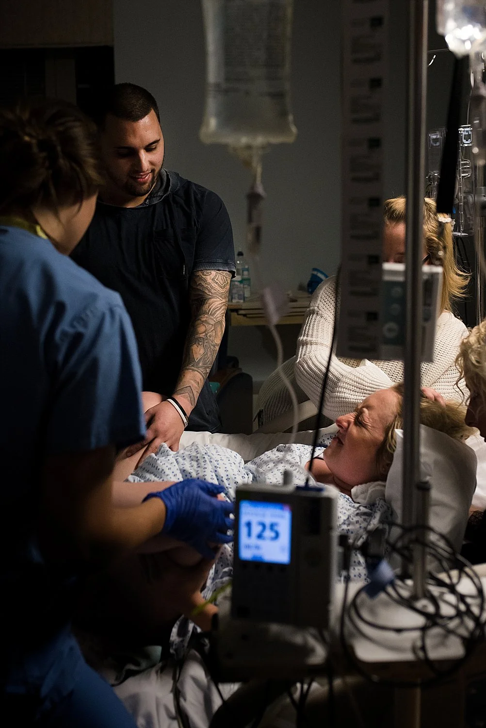 Mother in labor at St Francis Hospital birth photographer.