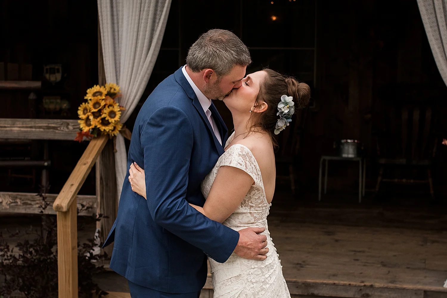 bride and groom first kiss at central ct wedding, with ct wedding photographer