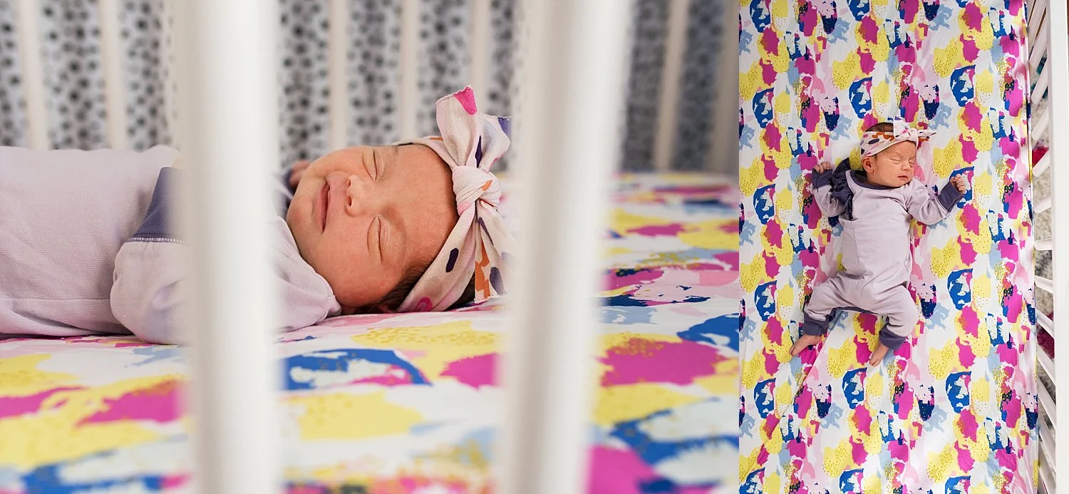 Baby girls in hr crib on her colorful crib sheets. Baby photography CT
