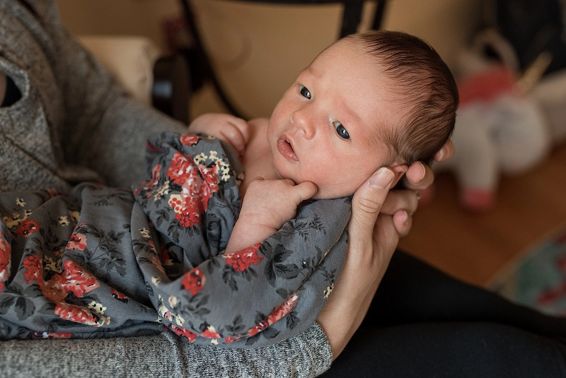 New baby girl in a flower swaddle. Connecticut newborn photography