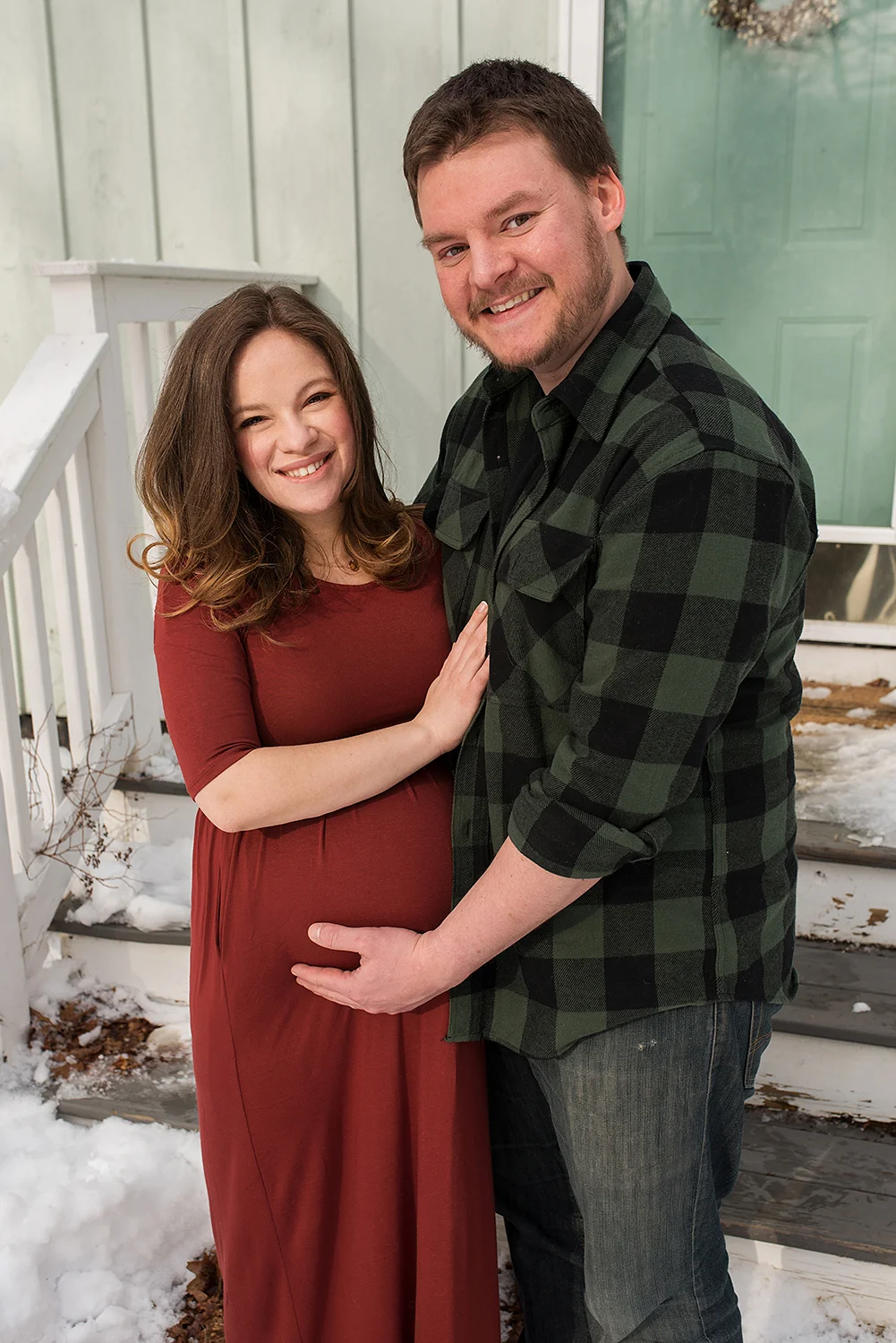 Connecticut maternity photographer. new parents excitedly waiting for their new baby.