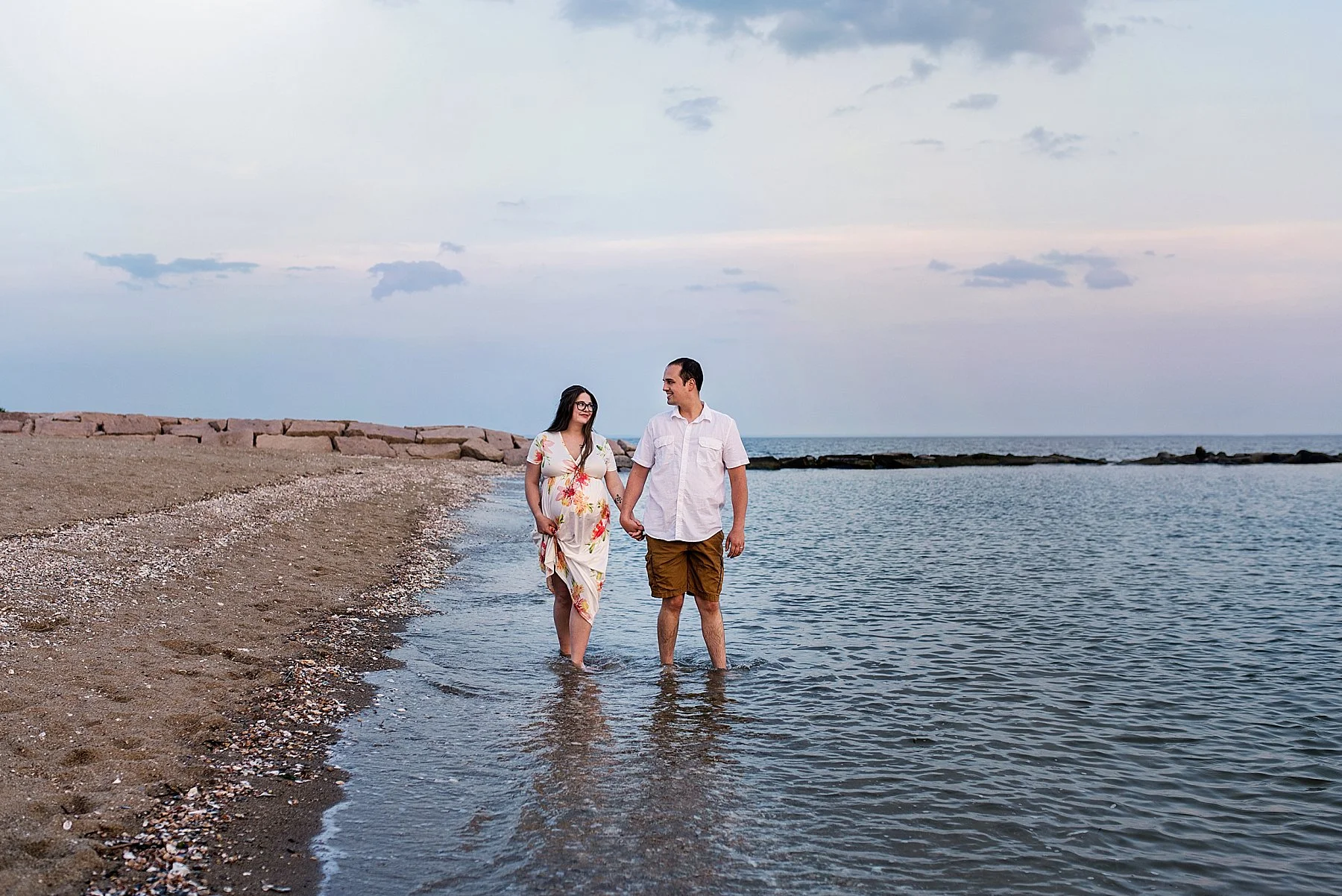 ct shoreline photographer. husband and wife expecting first baby
