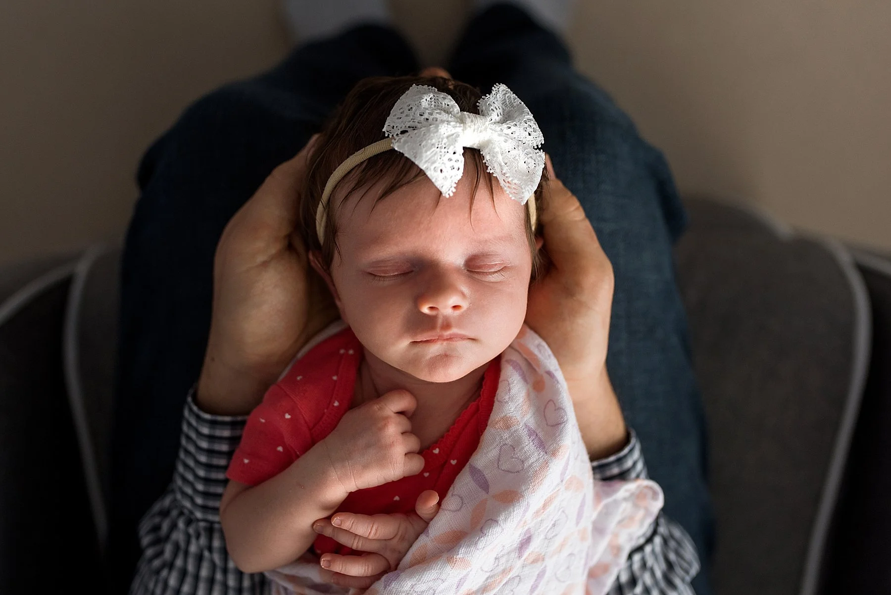 newborn daughter sleeping in dads hands portaits. ct newborn photographer