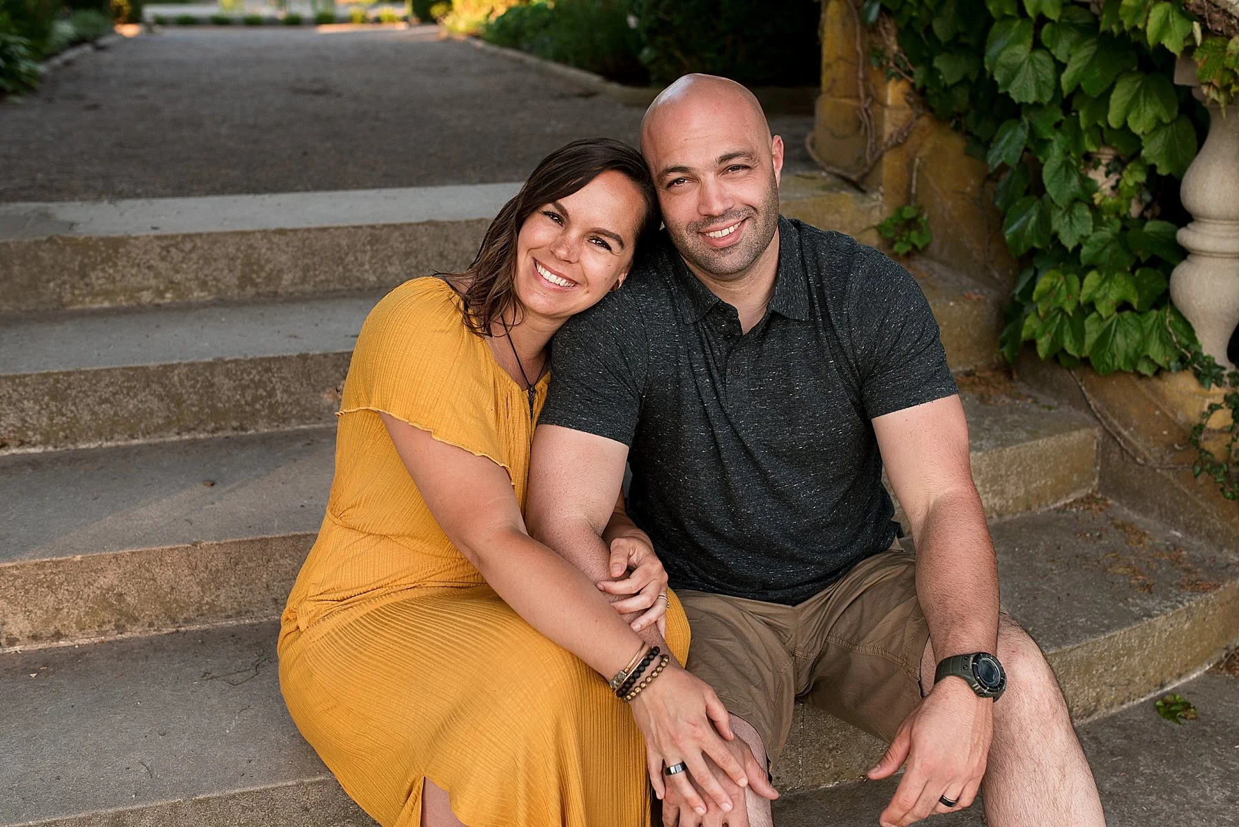 husband and wife posing together during CT photo session