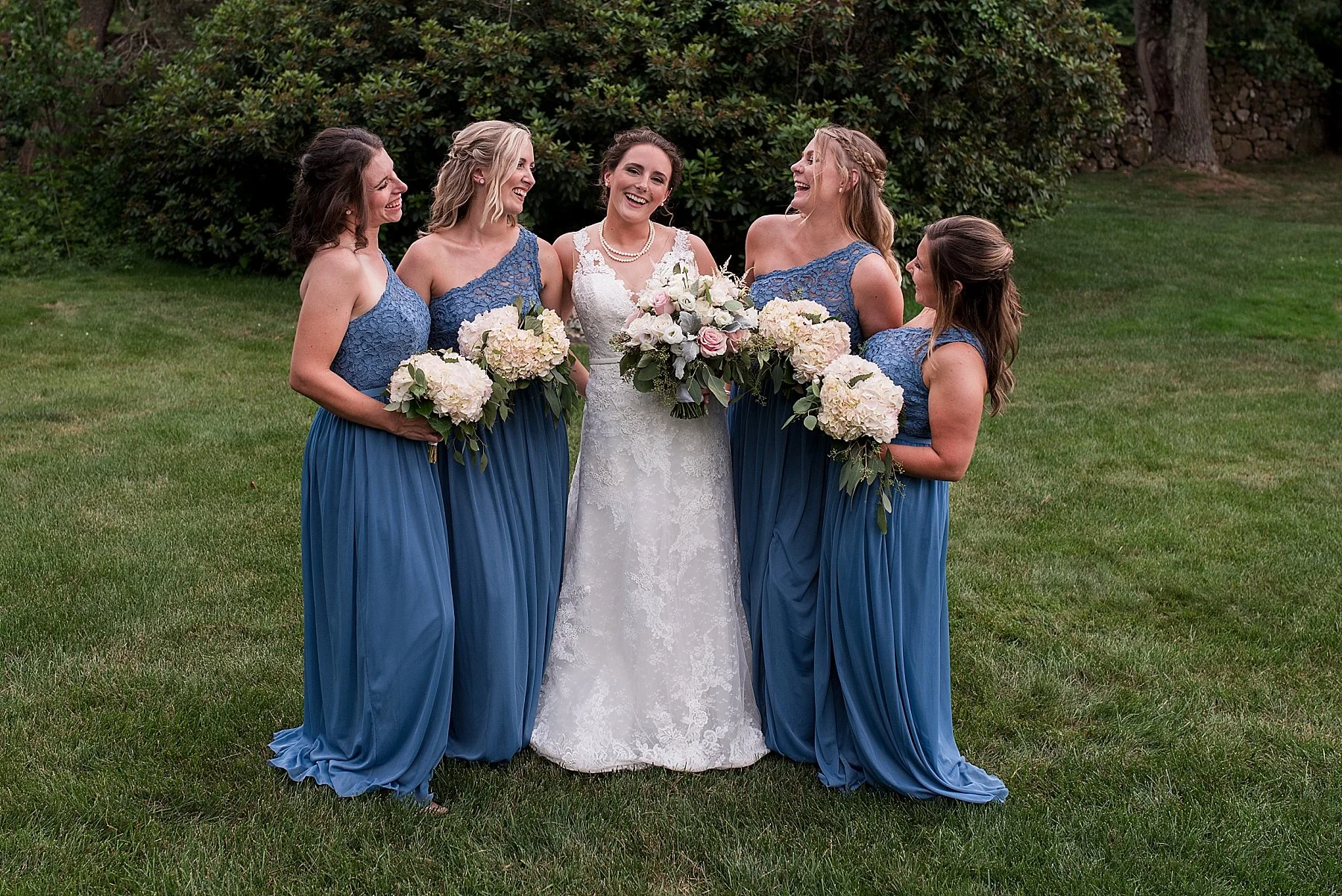 Bride with bridesmaids in blue dresses