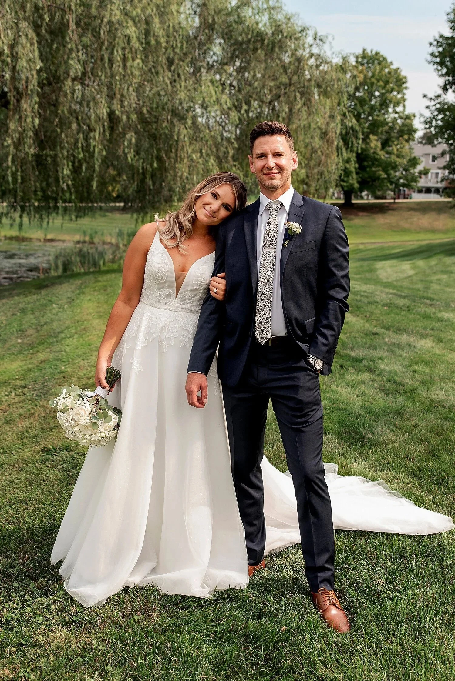 bride and groom on the lawn at Middletown CT wedding venue