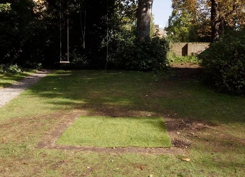 The hole re-buried. 
