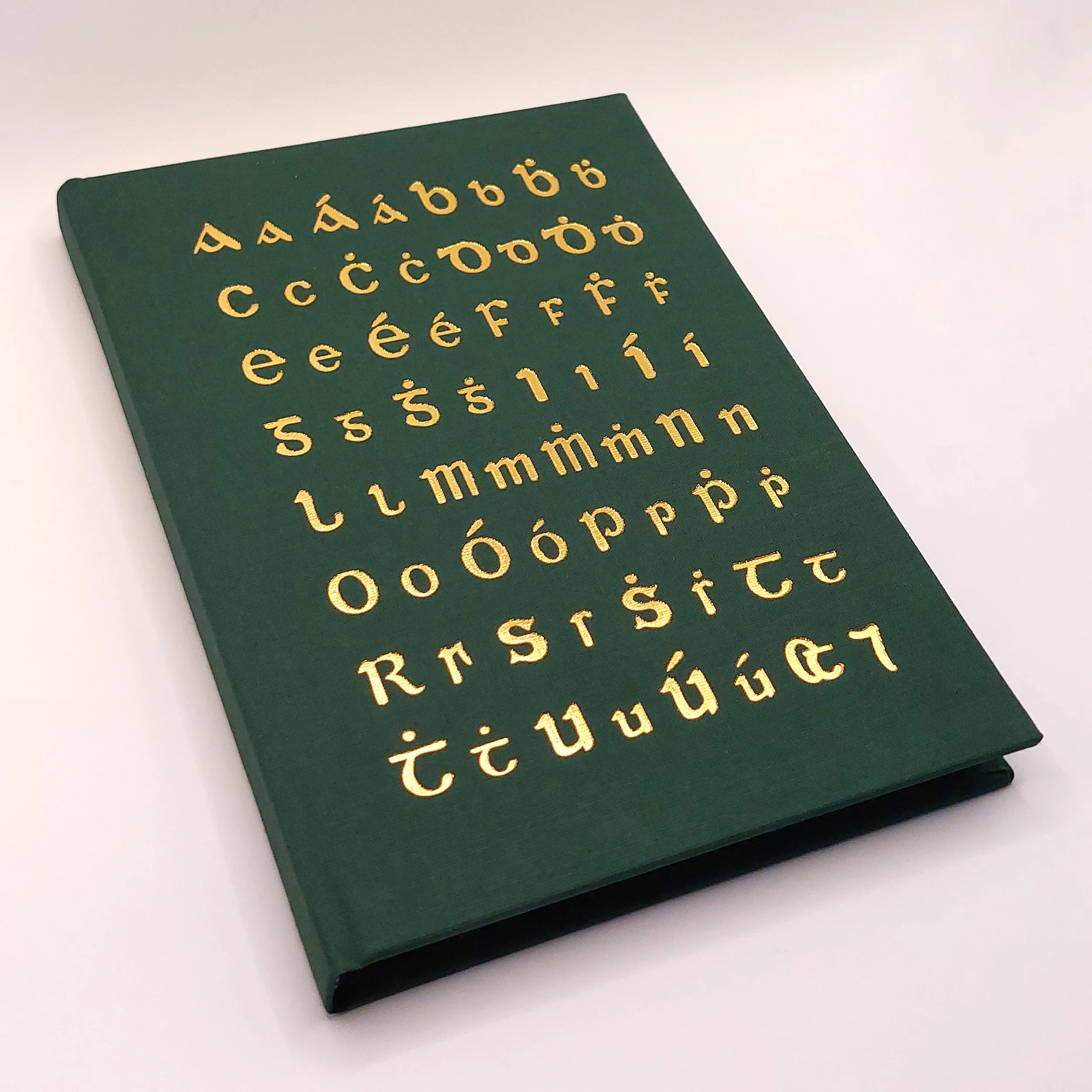 Nine-Arrow-Clo-Gaelach-Foil-Print-Notebook-angle.jpg
