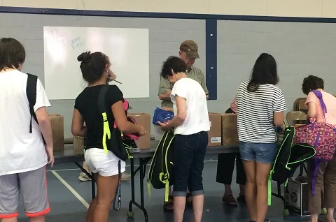 OLM Delivers 150 Backpacks with Supplies to St. Patrick's Parish!