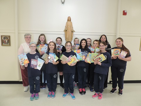 OLM School's Friends of Mercy Collect Books for Hasbro Children's Hospital