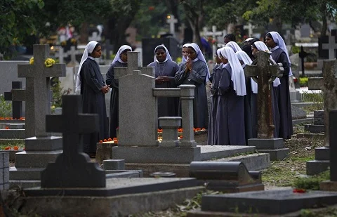 Praying for the Dead and Voting as a Catholic, Essential Duties of Our Faith