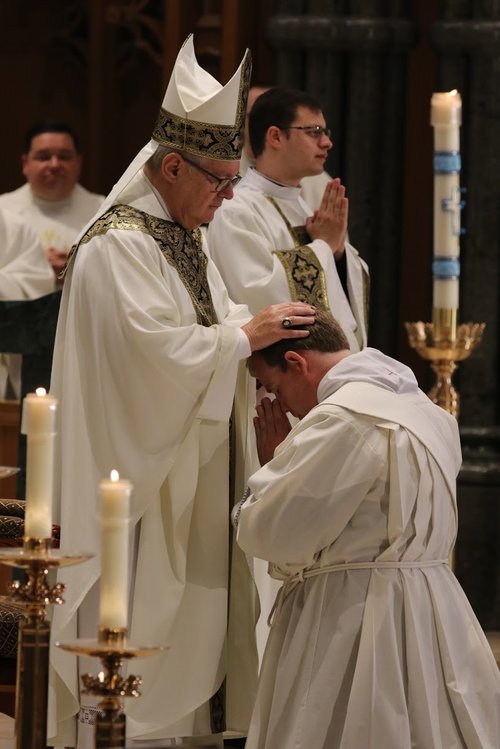Bishop Thomas Tobin of Providence ordains Brian Morris a priest in June 2017 at the Cathedral of Saints Peter and Paul, Providence, RI.