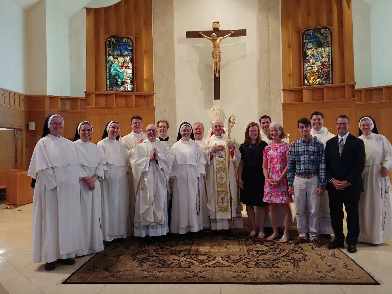 The Dominican Sisters and Friars join with Bishop Evans and Laura Makin and her family after the Mass.