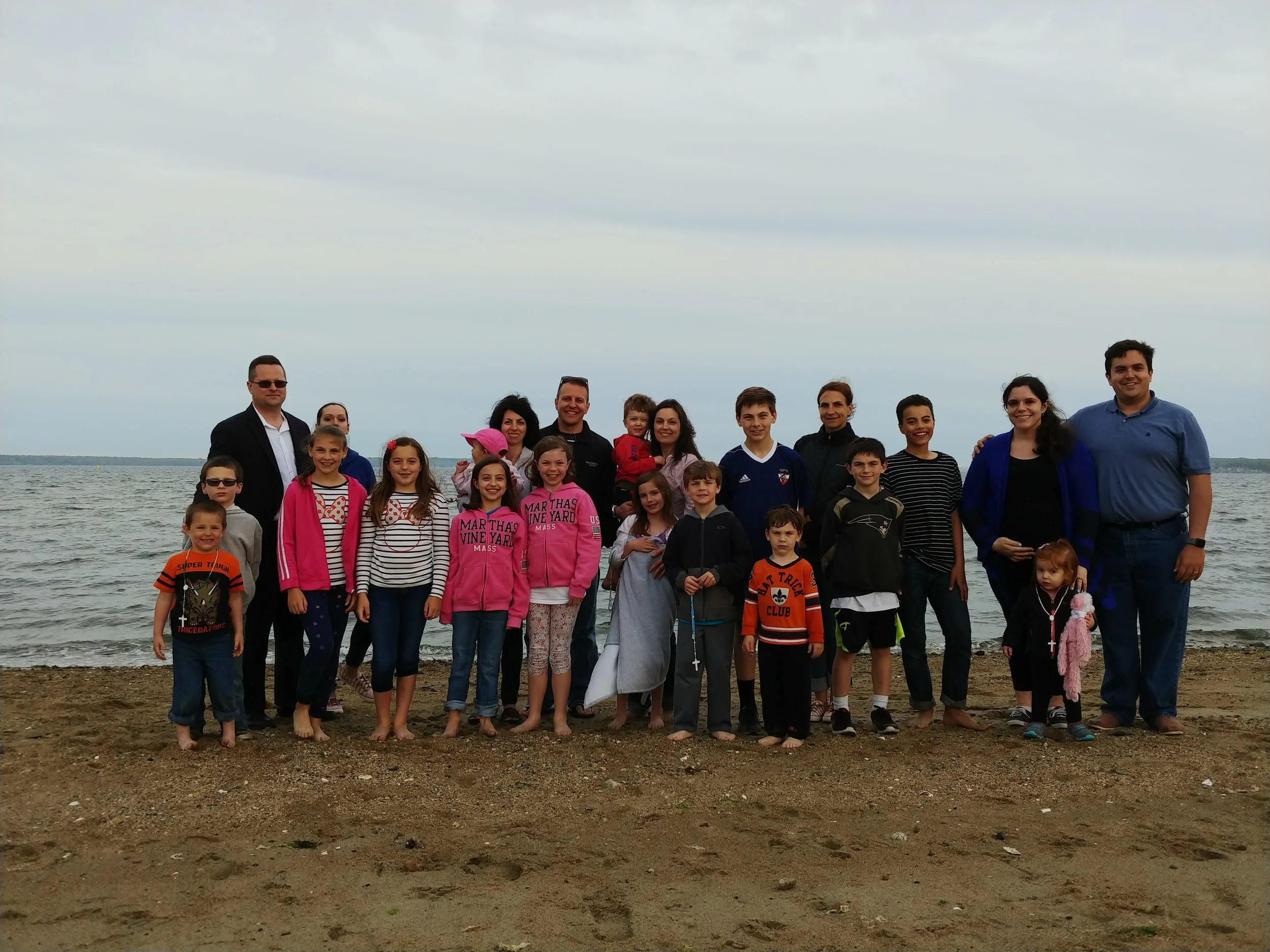 Young Family Group at the beach Summer 2018.