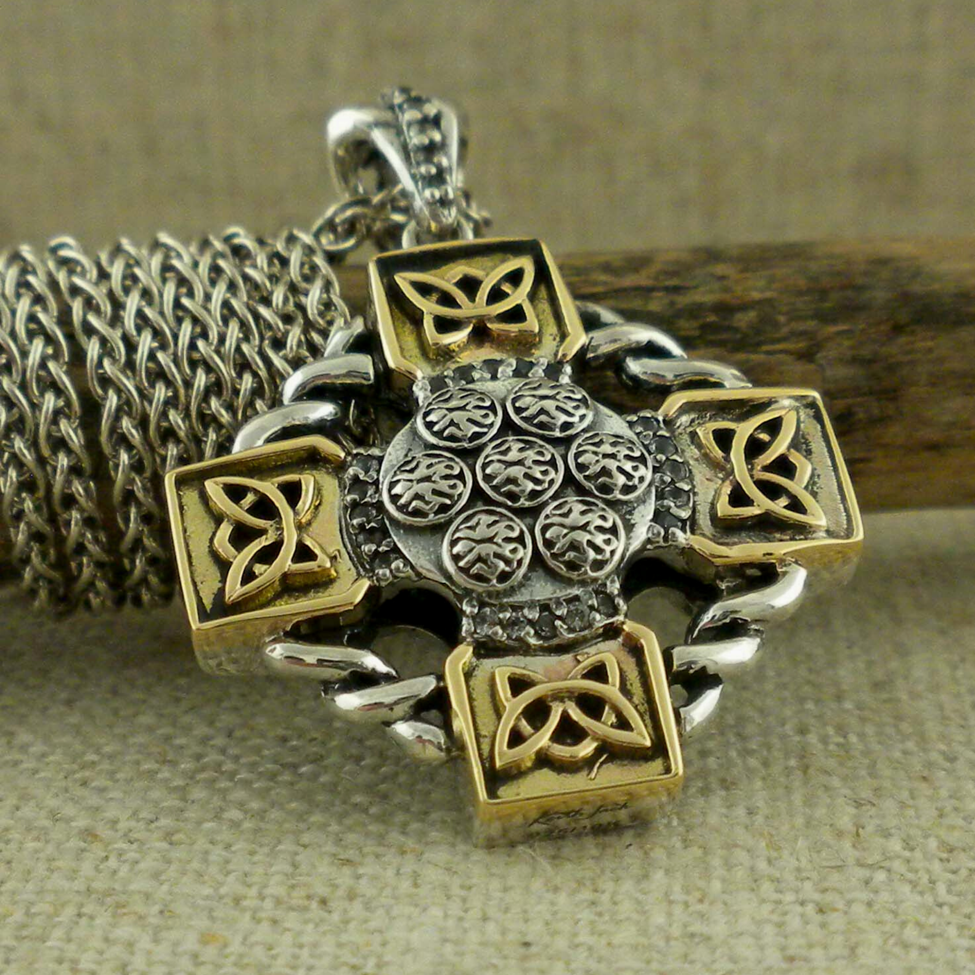 Sterling Silver and 10K Celtic Wheel Cross by Keith Jack