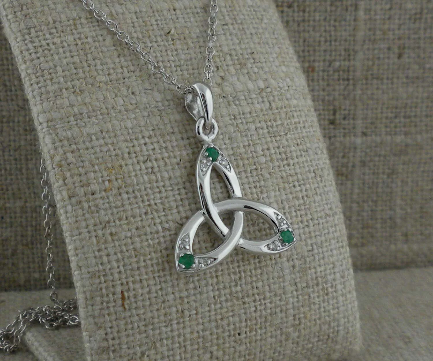 Silver Trinity Knot Pendant with Emeralds &amp; Diamonds