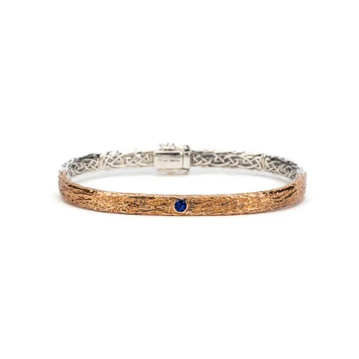 Sterling Silver and Bronze Celtic Bangle with Lab Sapphire