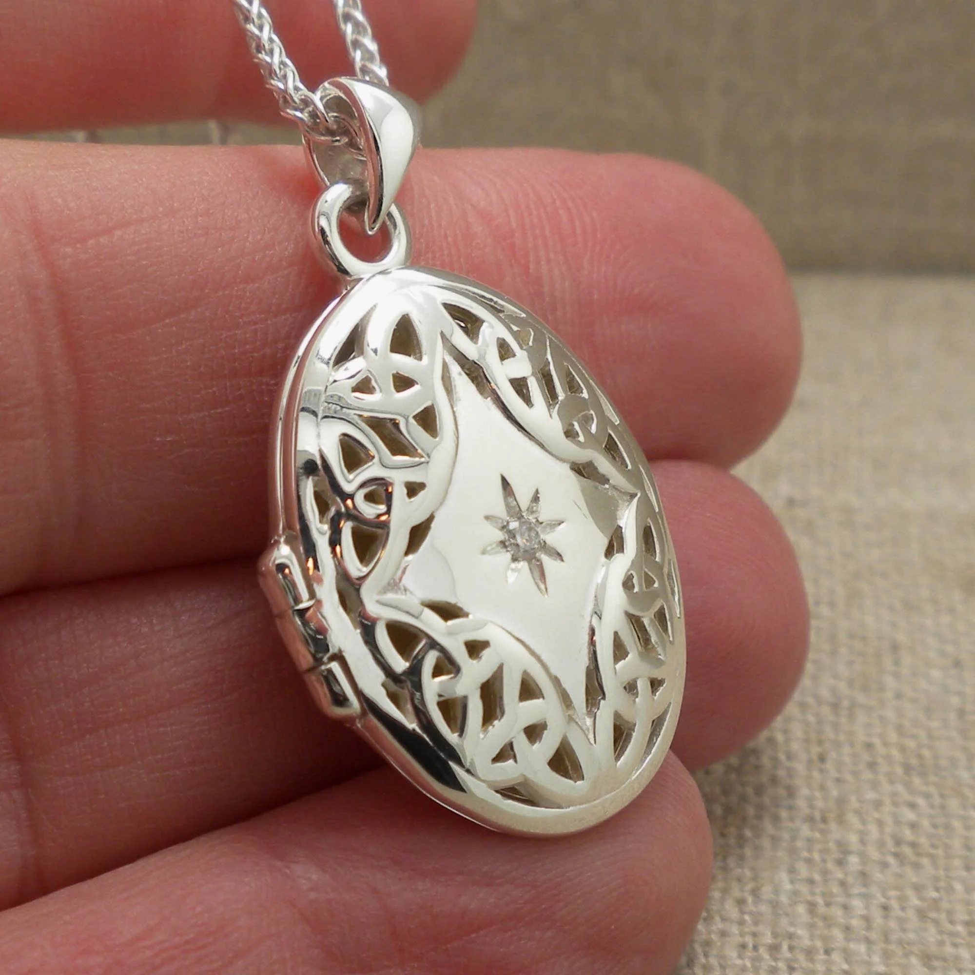 Trinity Knot Locket with Star Diamond