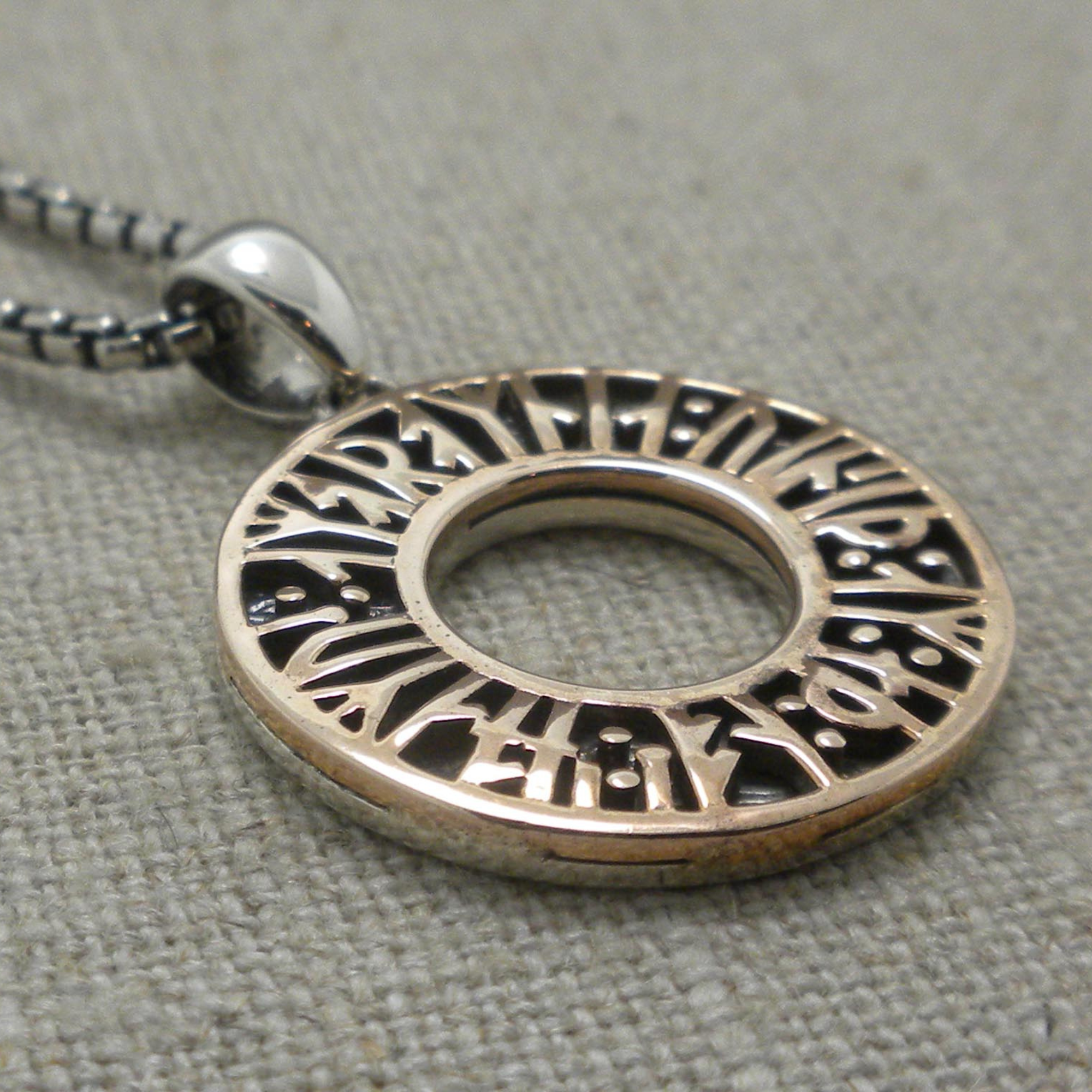 02-BP9975-keith-jack-rune-pendant.png