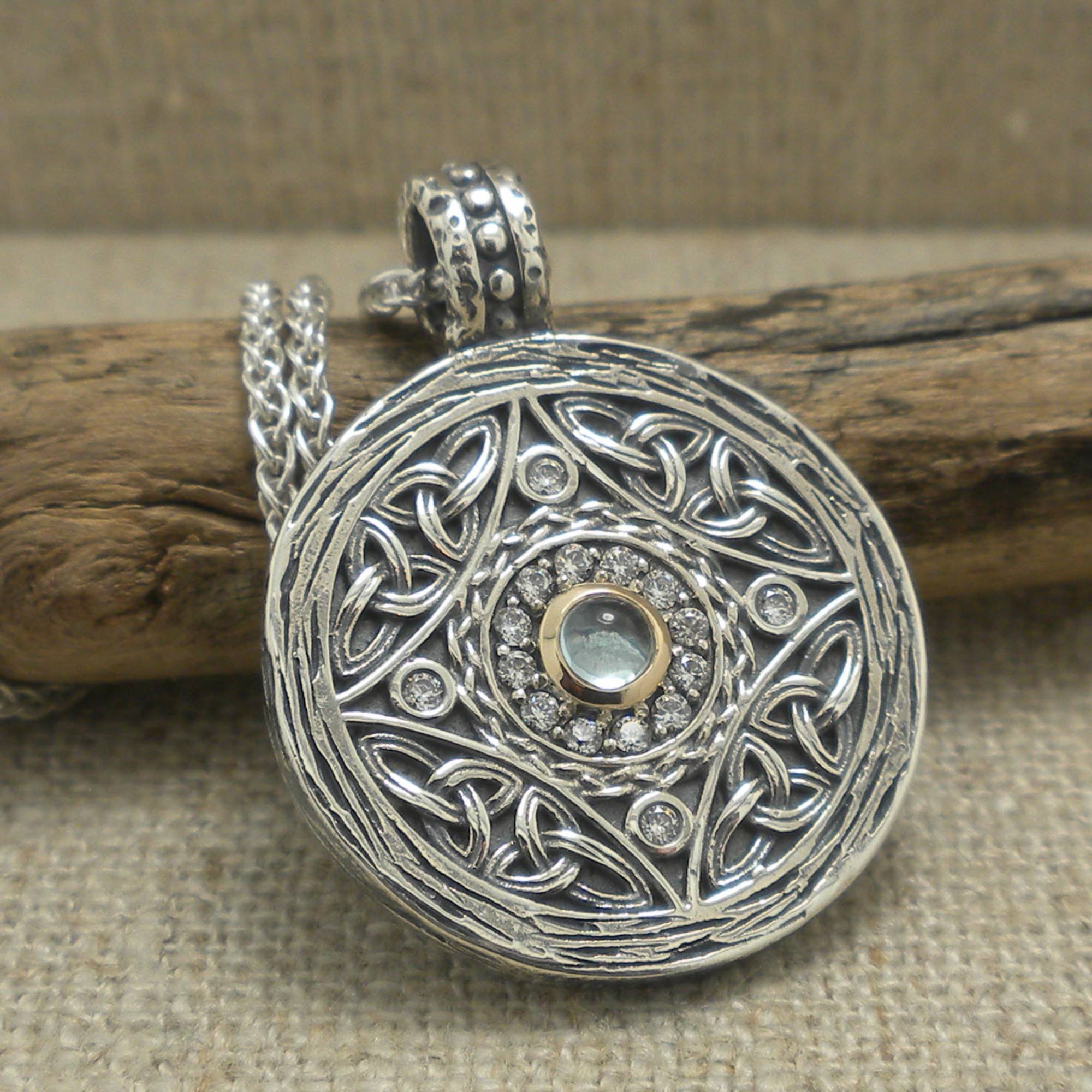 Sterling Silver and 10K Shield Pendant with CZs and Blue Cabochon