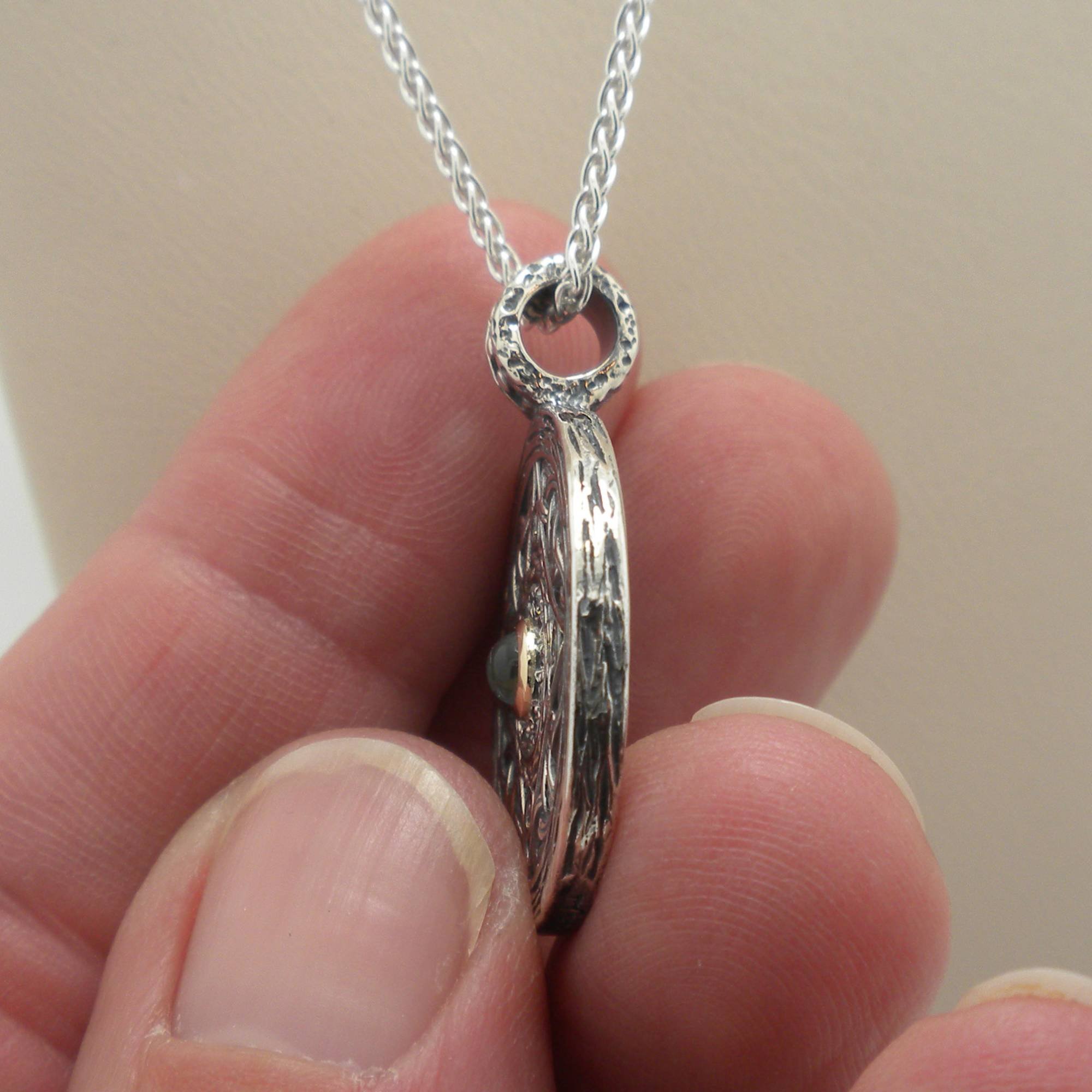 Sterling Silver and 10K Shield Pendant