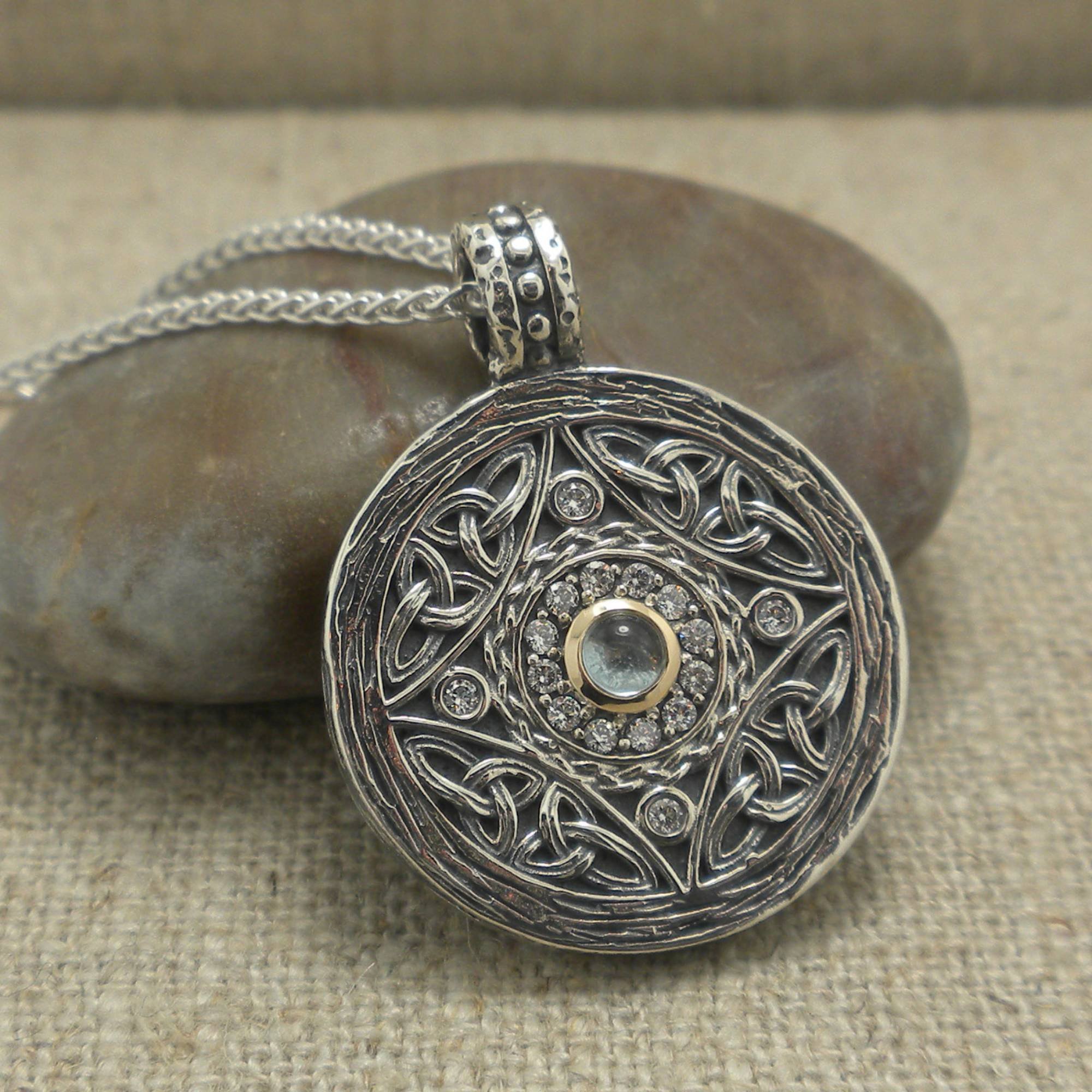 Sterling Silver and 10K Shield Pendant with CZs and Blue Cabochon