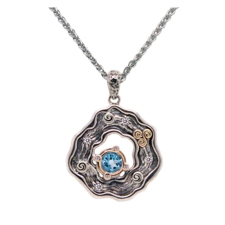 Celtic Spirals Sterling Silver and 10K Rocks 'N Rivers Pendant with Sky Blue Topaz