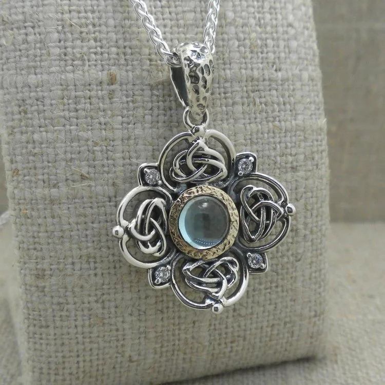 Small Sterling Silver and 10K Sky Blue Topaz Celtic Celestial Pendant