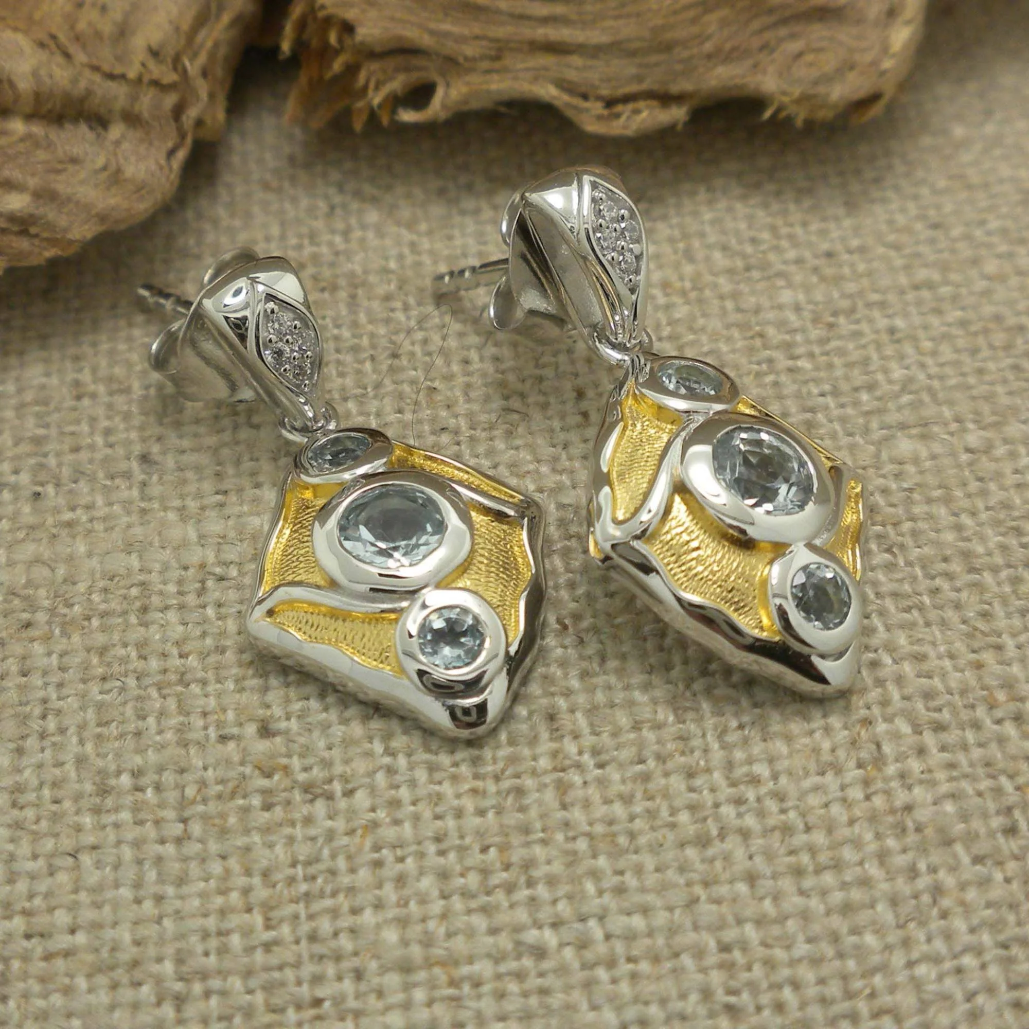 Sterling Silver Rocks N' Rivers Stud Earrings with 23K Gilding and Blue Topaz 