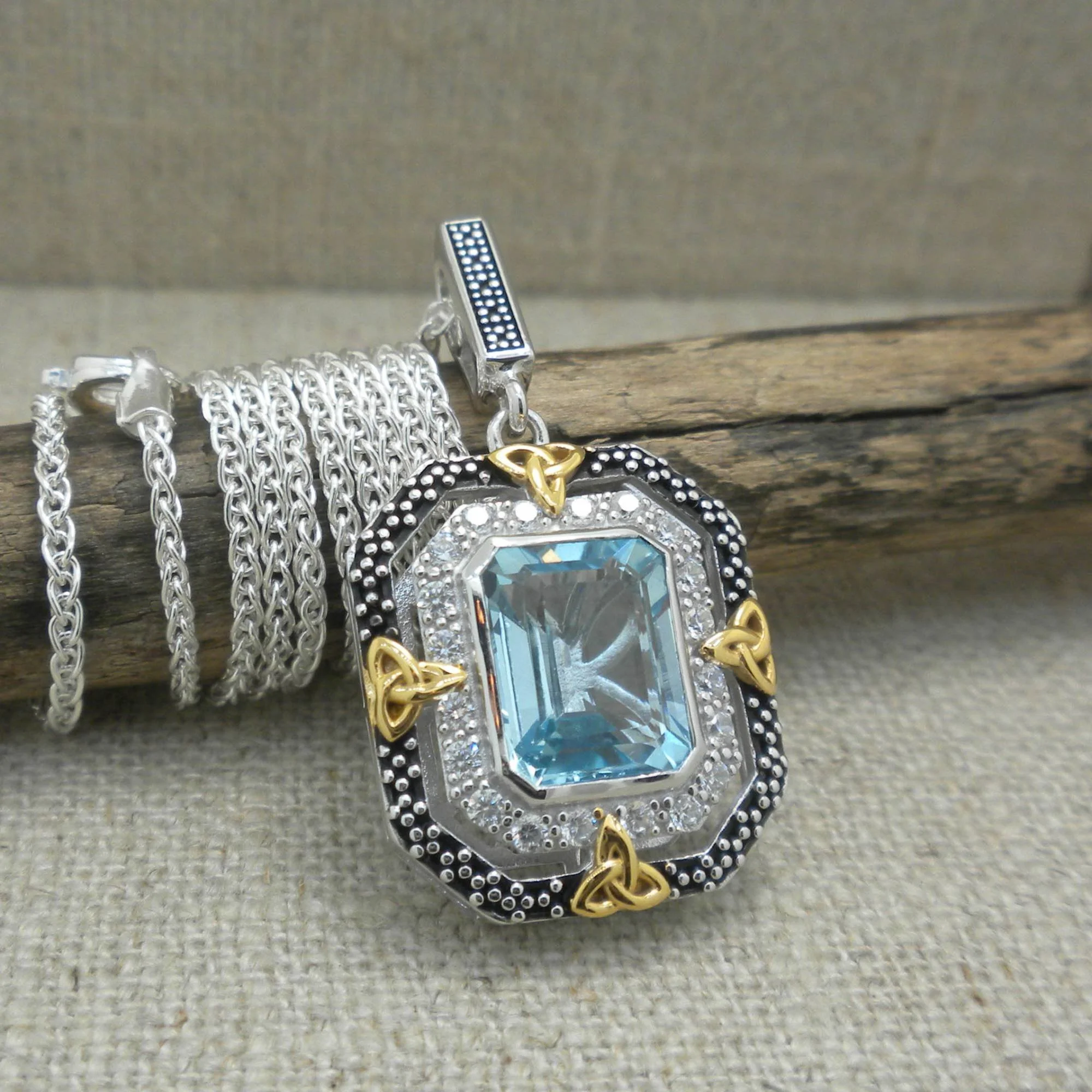 Sterling Silver &amp; 10K Octagon Celestial Pendant with Trinity Knots &amp; Blue Topaz