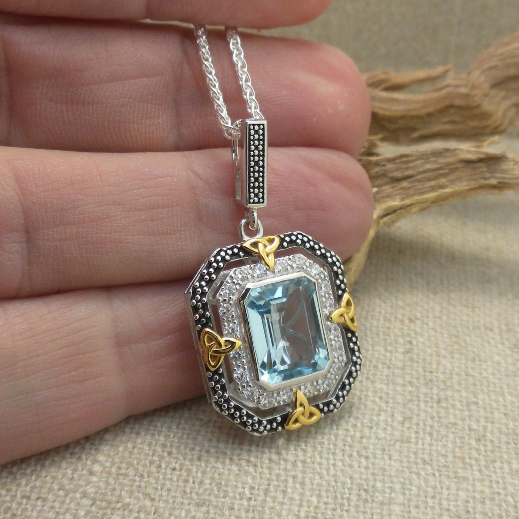Sterling Silver &amp; 10K Octagon Celestial Pendant with Trinity Knots &amp; Blue Topaz