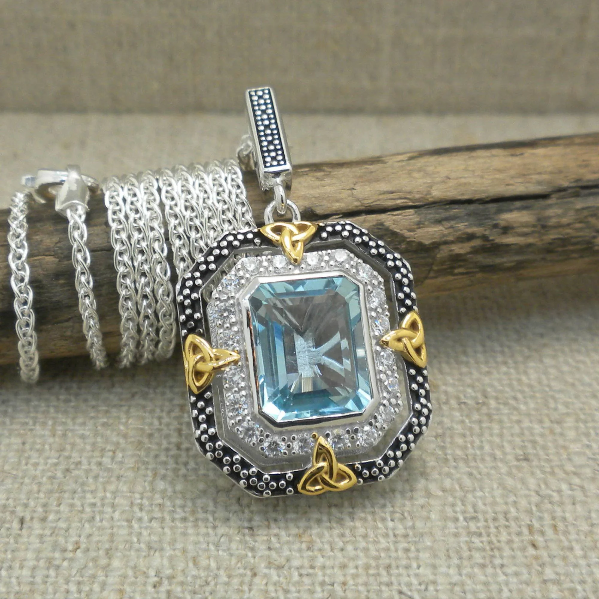 Sterling Silver &amp; 10K Octagon Celestial Pendant with Trinity Knots &amp; Blue Topaz