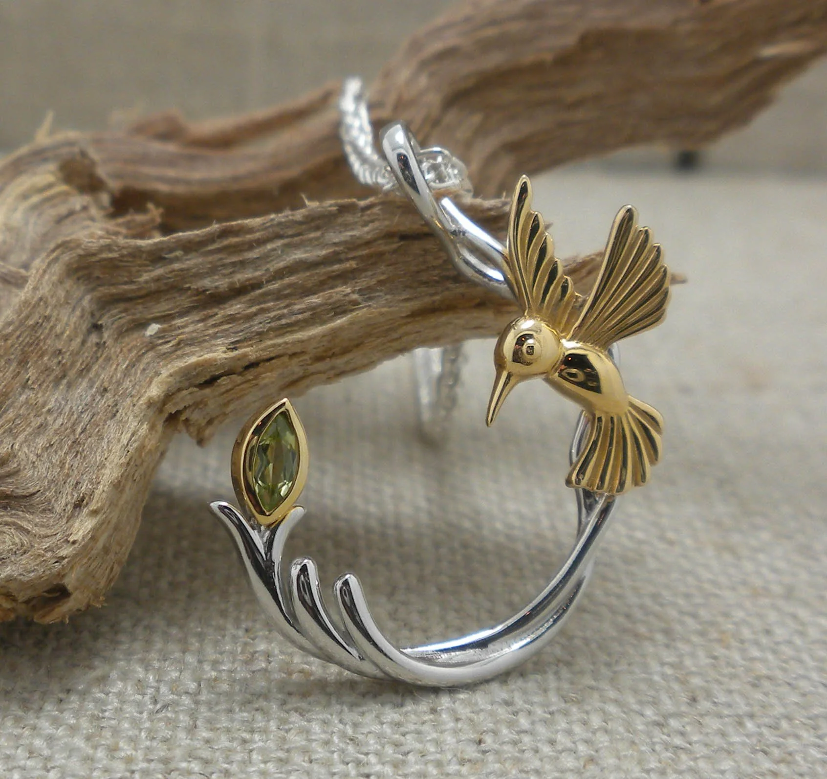 Silver &amp; 10K Hummingbird Pendant with Peridot 