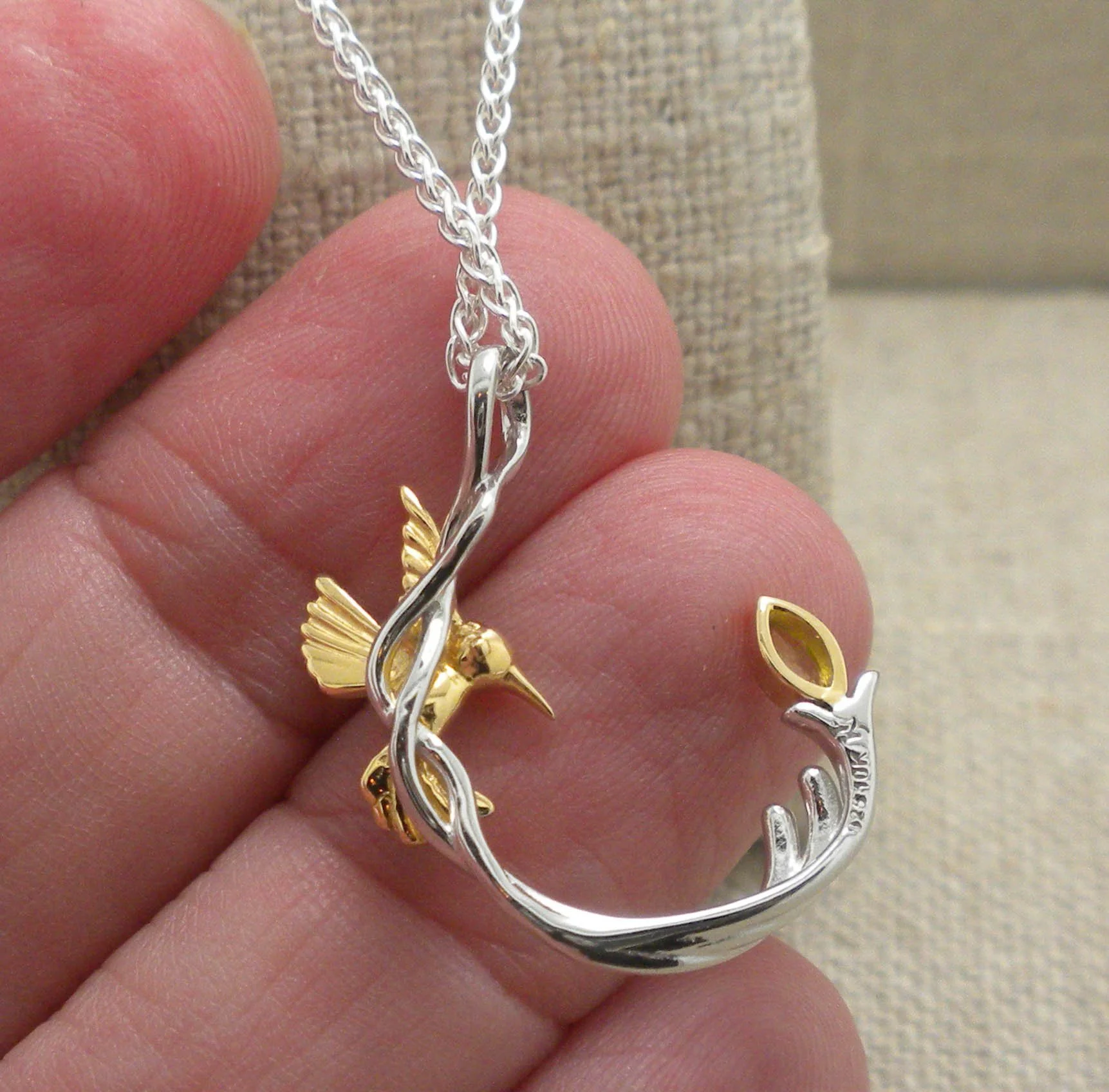 Silver &amp; 10K Hummingbird Pendant with Peridot 