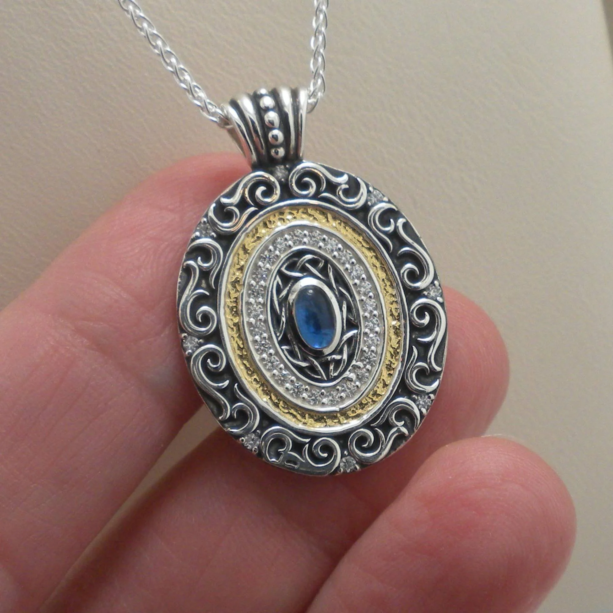 Sterling Silver and 14K Gilding Shield Pendant