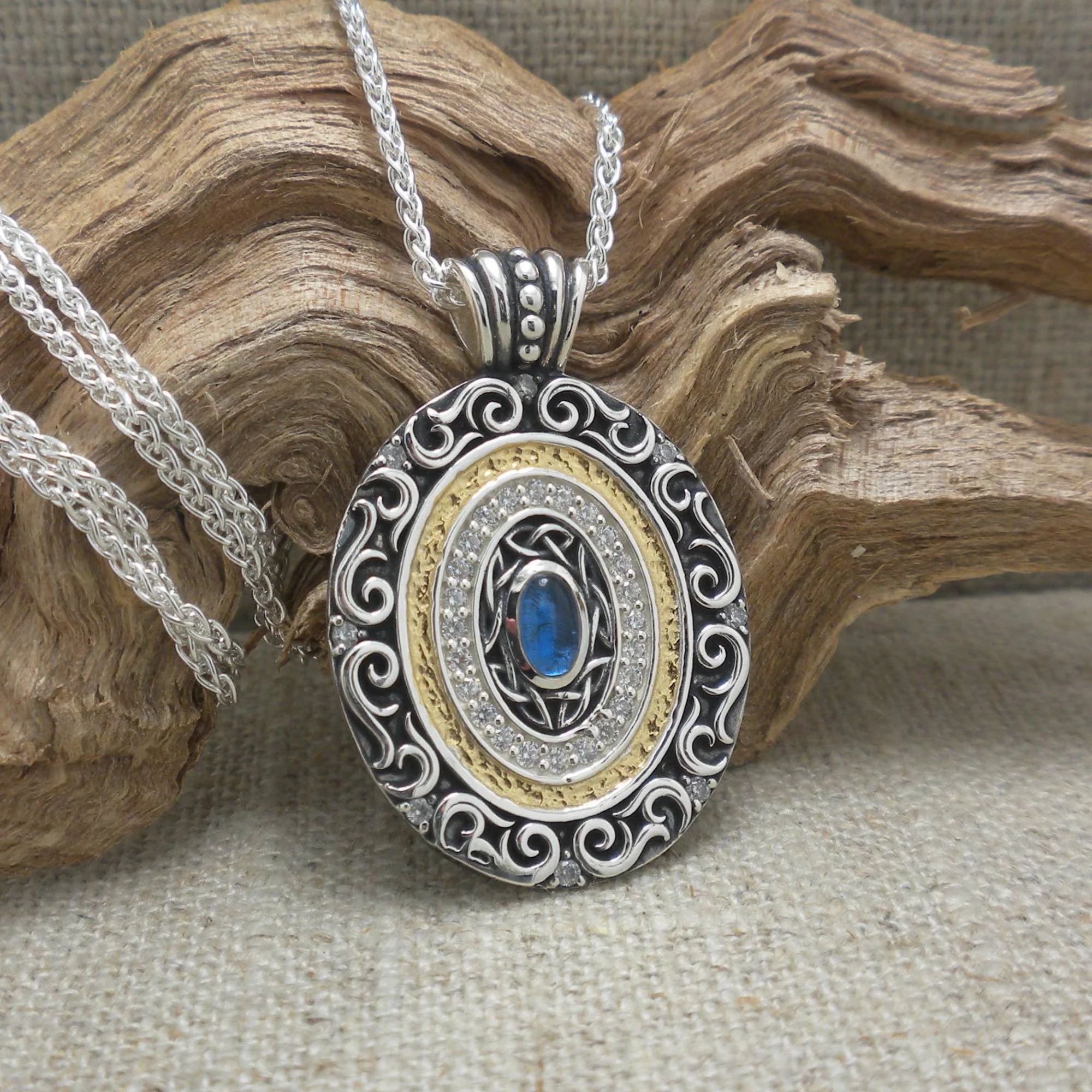 Sterling Silver and 14K Gilding Shield Pendant with CZs &amp; Synthetic Blue Sapphire