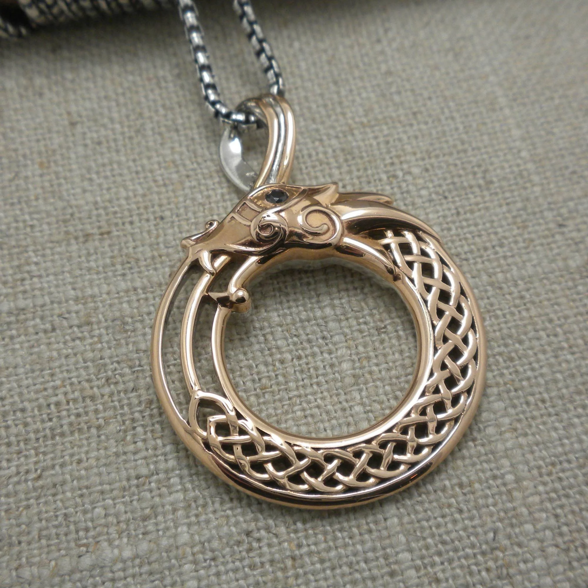 Sterling Silver &amp; Bronze Celtic Dragon Pendant with Black CZ Eye