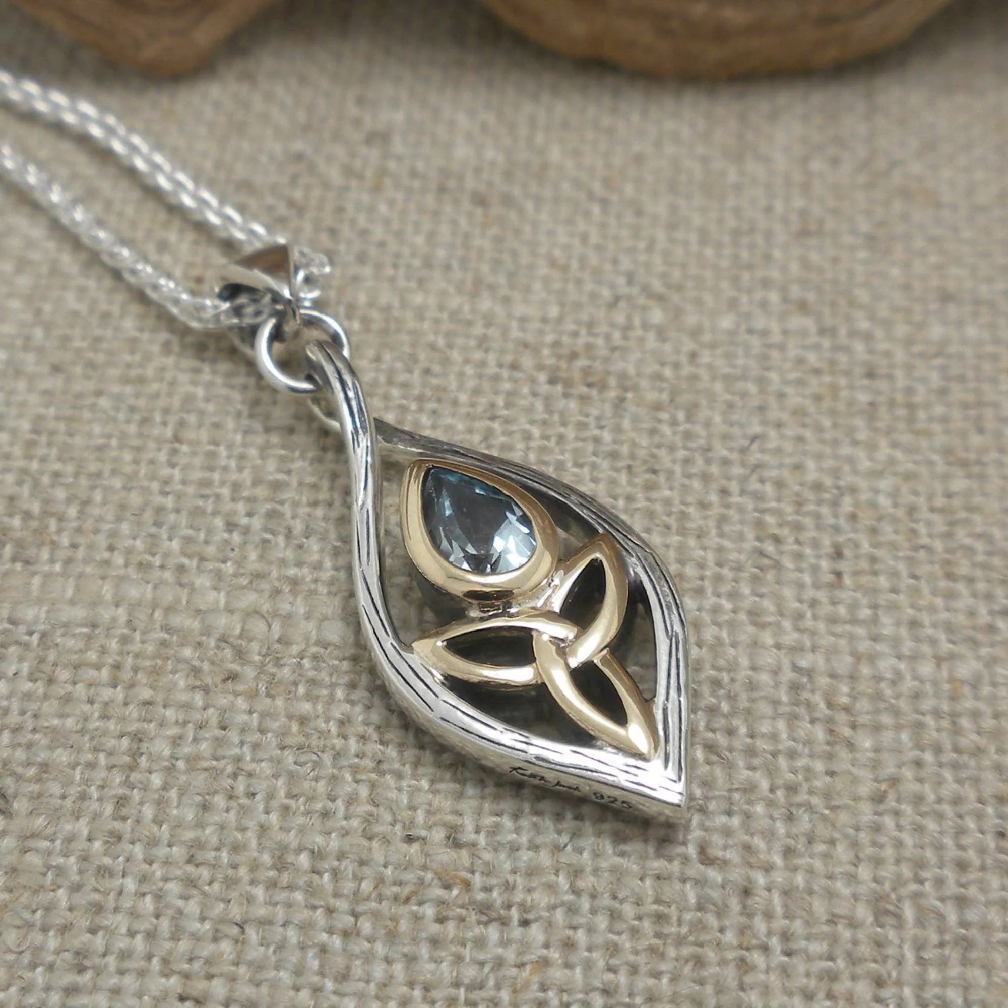Blue Topaz Guardian Angel with Trinity Knot