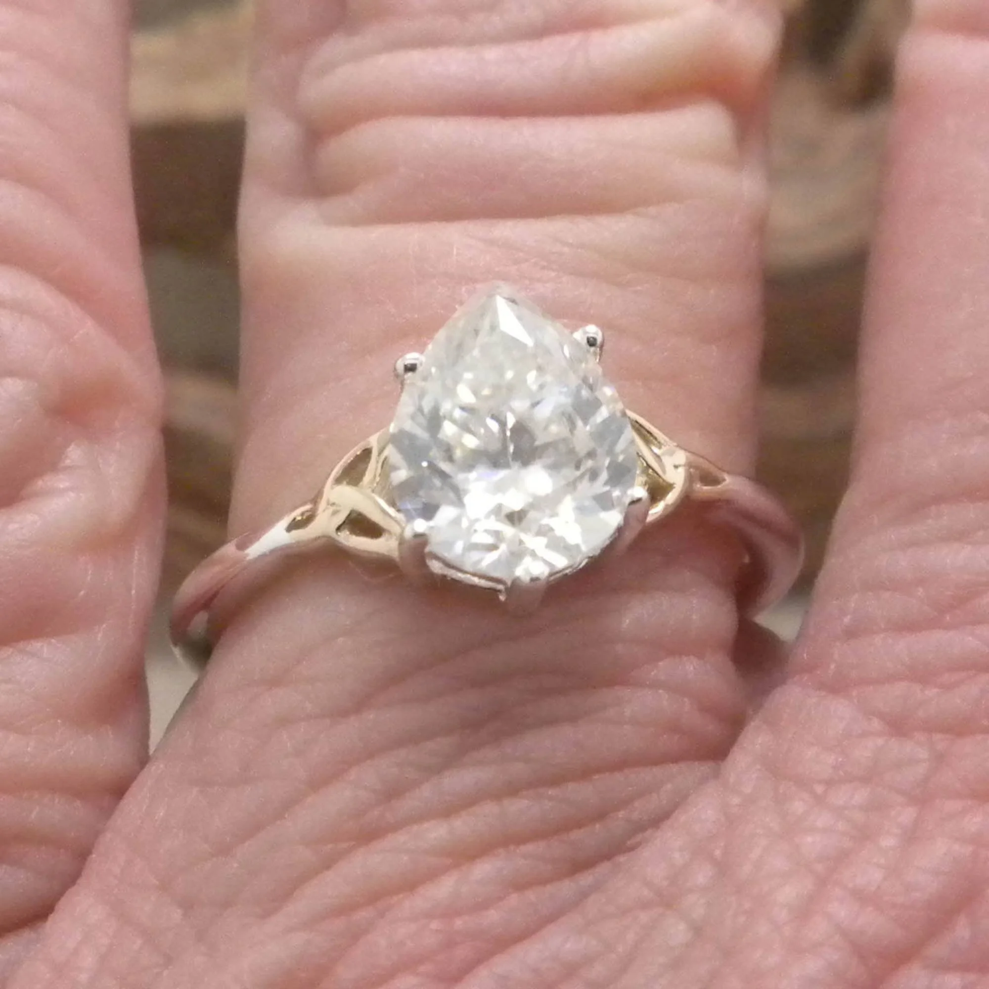 Silver and 10k Gold White Moissanite Trinity Ring