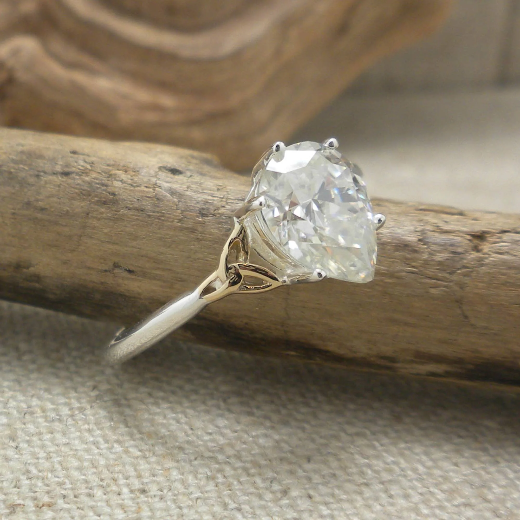 Silver and 10k Gold Trinity Pear Shaped Trinity Knot Ring